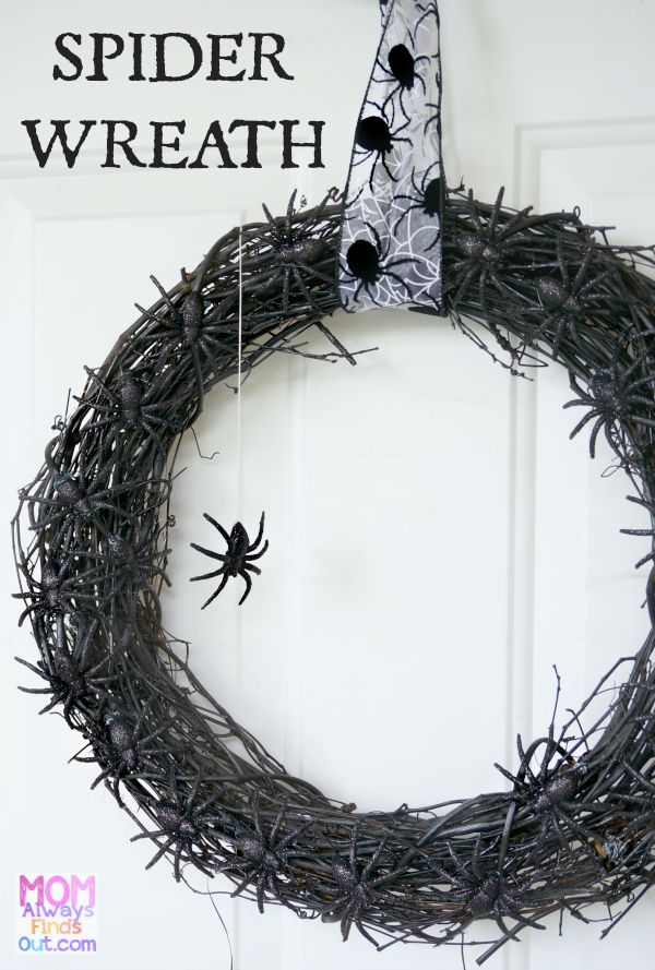 Halloween Crafts - Black Glitter Spider Wreath DIY Halloween Wreaths - Tutorial at @momfindsout