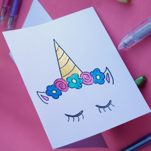 DIY Unicorn Doodle Card with Pentel POP gel pens are a must for your coloring pages, homemade cards, and journals. Pentel POP gel pens come in a variety of vivid colors that make writing, drawing and coloring fun.