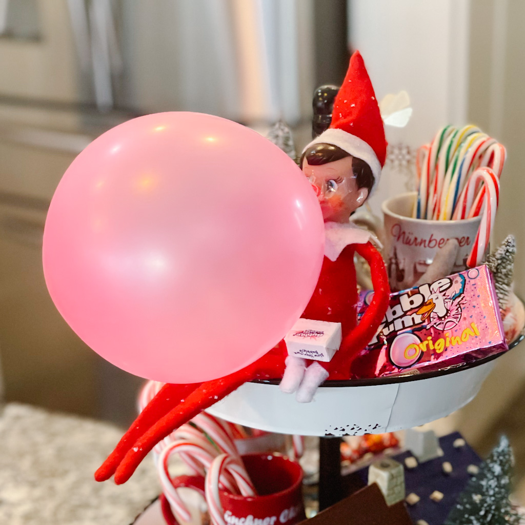 Quick and easy elf on the shelf ideas. The elf blows a huge bubblegum bubble!